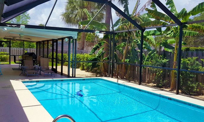 South Patrick Shores House | Immaculate beach house with amenities and heated pool - 5 min bike ride to beach