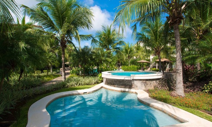Coco Condo | Impressively Designed 3rd-floor Space Overlooking Pool in Coco