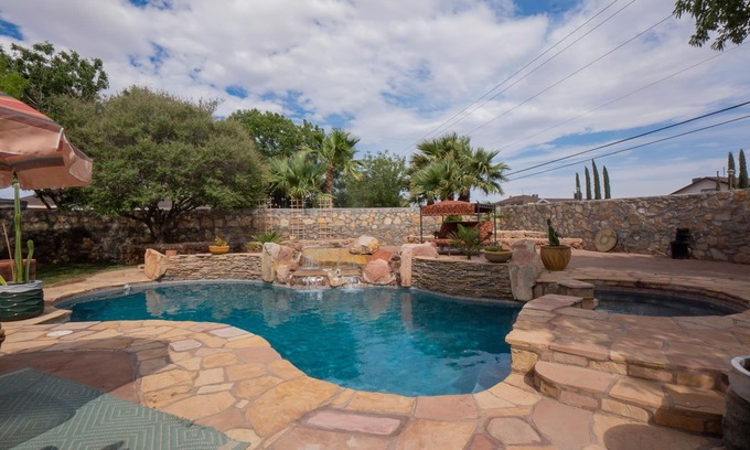 Biggs Field House | Incredible home with custom pool and fountain