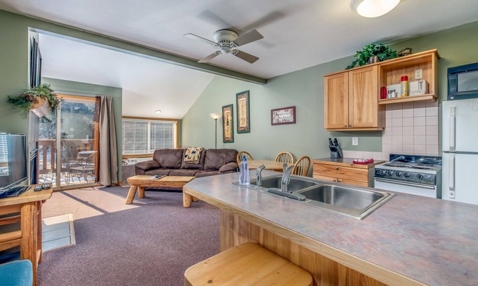 Estes Park Condo | Indulge in the unparalleled comfort of the Riverview Suite End Unit.