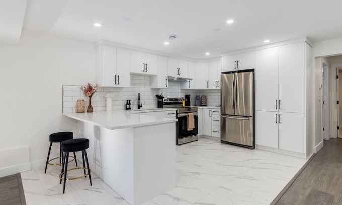 Chestermere Apartment | "Inky & Rose" Stylish Two Bedroom Lower Suite