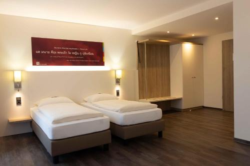 Burbach Hotel | Internationales Tagungszentrum Karimu