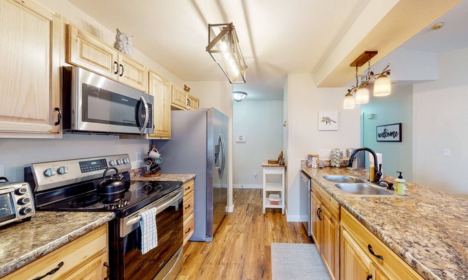 Post Falls House | Inviting dog-friendly home with hot tub, grill, patio, central AC, & W/D