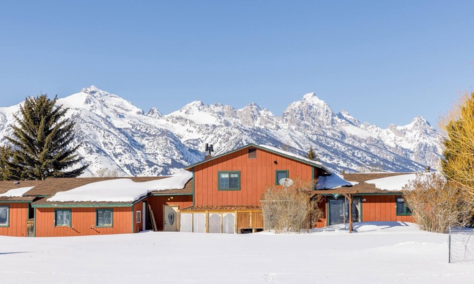 Jackson Hole House | Inviting home with mountain view, fireplace, golf nearby, & washer/dryer