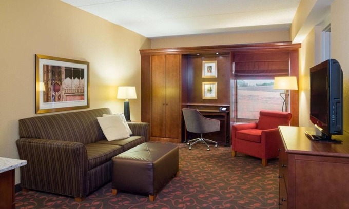 Carlisle Hotel | Inviting Retreat with In-Room Movies and Free Breakfast – Steps from I-76 Access