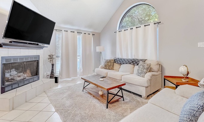 Dallas House | Inviting, two-story home on a large lot with a private pool, gas fireplace, & AC