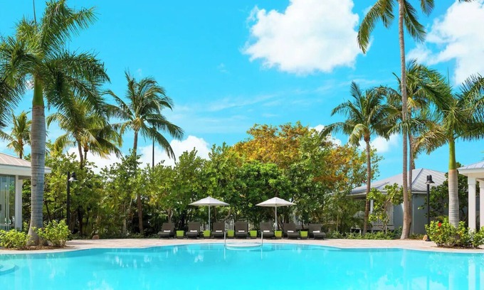 New Town Hotel | Island Charm & Retro Fun | Pools, Comfort Eats, Shuttle & Fire Pits