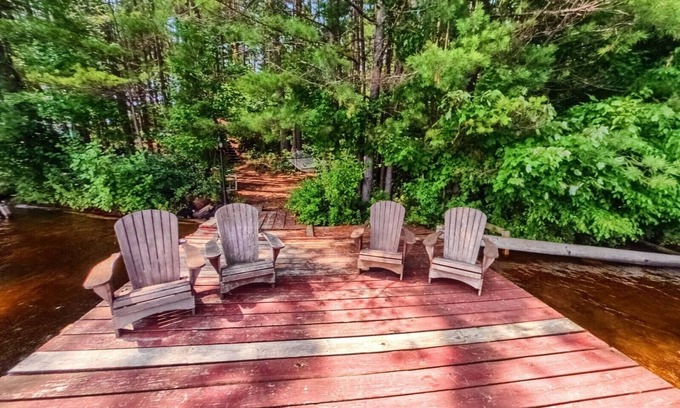 Brantingham Cottage | Island Cottage sleeps 8, dogs run free, Pontoon Boat, Hottub. Featured on ABC