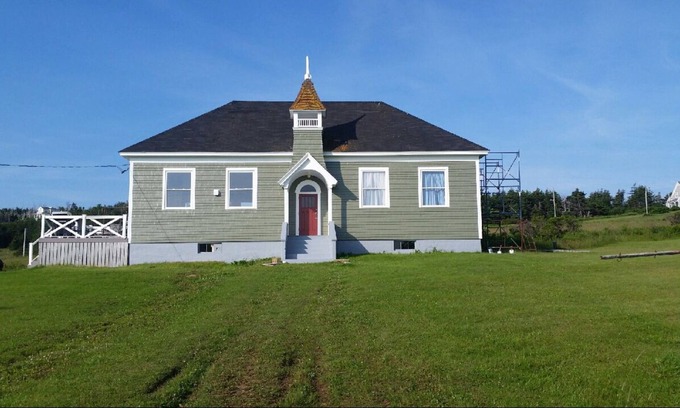 Port Hood Cottage | Island Retreat in Elegantly Restored Schoolhoue with Panoramic Ocean Views