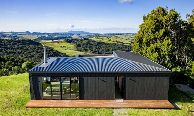 Mangawhai House | Island View - Designer holiday home with fabulous indoor outdoor living and spectacular views