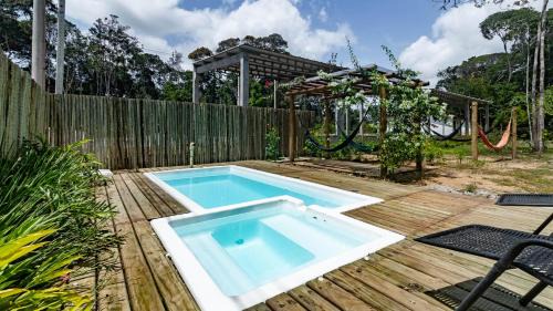 Porto Seguro Apartment | ITAKAA STUDIO Piscina, Hidro e Quadra em Arraial