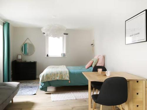 Saint-Claude Apartment | Joli studio zen et cozy au coeur de Saint Claude