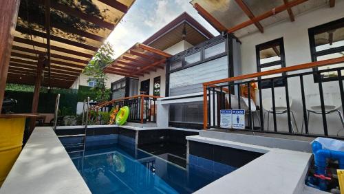 Tagudin Bed & Breakfast | Jolie Joe's Bed and Breakfast with Shared Bathroom
