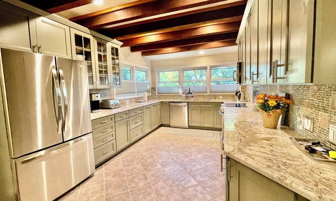 The Glade House | Just minutes to the beach with a hot tub and fire pit!