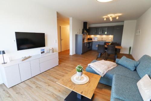 Tossens Apartment | KÜSTE33/20 – Exklusive Ferienwohnung mit Sauna & nah am Strand!