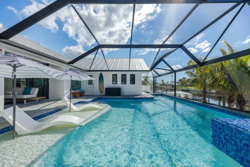 Cape Coral House | Kayaks, Boat Dock, Heated Pool & Spa, Outside Kitchen, Tiki Hut - Villa Pedro - Roelens Vacations
