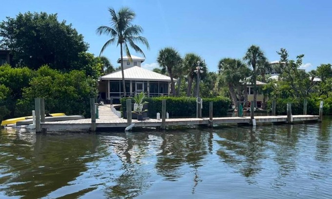 Placida House | Keep your boat in view from the house! Private dock; boardwalk leads to beach