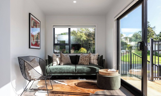 New Plymouth House | Kick back and relax in this calm, stylish space.