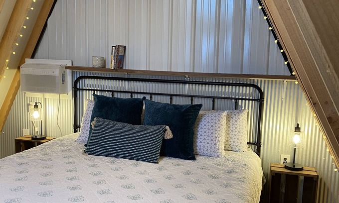 Mammoth Cave RV Rental | King bed in Tulip Glamping Aframe at Noble Pine Campground
