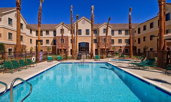 Palmdale Apartment | King Suite. Free Breakfast. Outdoor Pool & Hot Tub. Near Edwards Air Force Base!