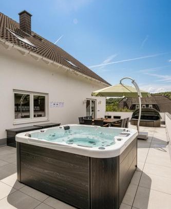 Niedershausen Apartment | Kleeoase - Luxus Apartment- Jacuzzi - Dachterrasse - Kochinsel - See in 10 min