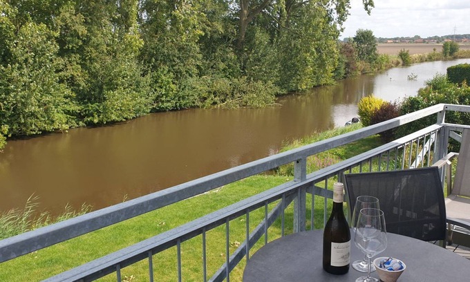 Eilsum Apartment | Kleine Auszeit 23 - Tolle Ferienwohnung für 4 Personen mit Balkon und Traumhaftem Blick!