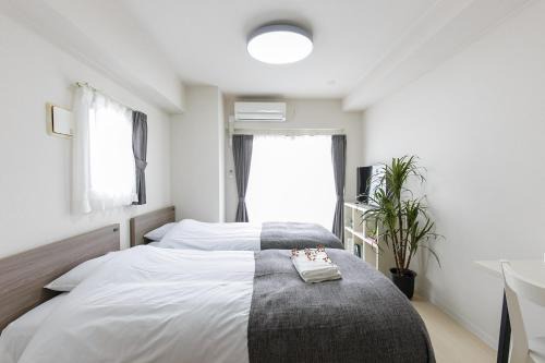 Naka Ward Apartment | KOMOREBI SQUARE OSU - Vacation STAY 17147