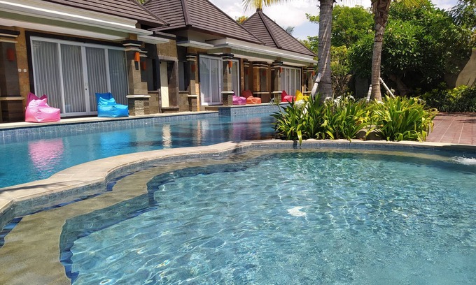 Gianyar Villa | Kori Maharani Villas - Lagoon Pool Access 3
