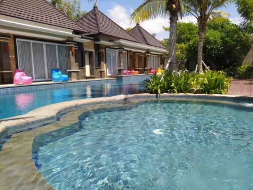 Gianyar House | Kori Maharani Villas - Lagoon Pool Access 6