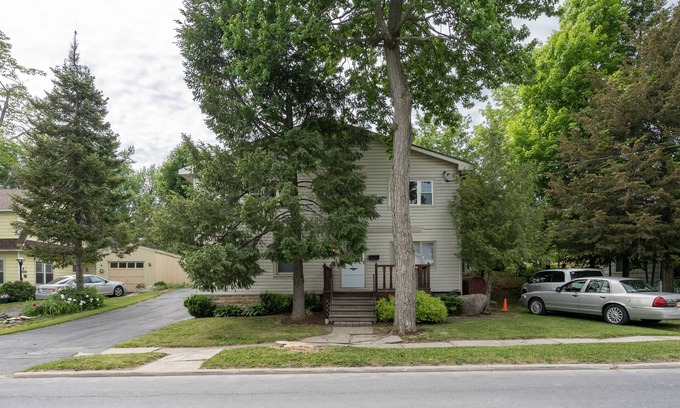 Alexandria Bay Apartment | kyacks and canoes can tie up in Backyard if you come in from the River