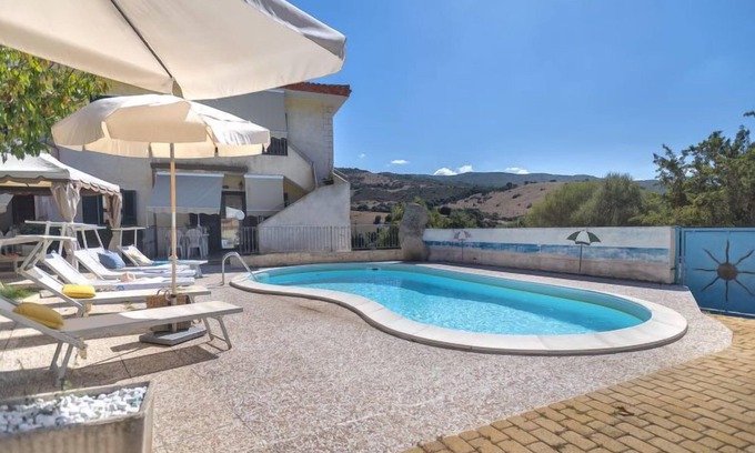 Trinita d'Agultu Apartment | L'Oasi Trilo A7 by Interhome
