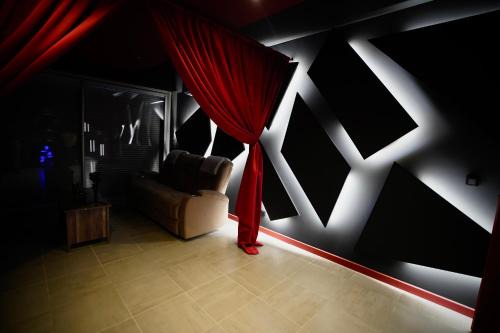 Quartier des Eaux-Claires Apartment | L unique Cinéma Room