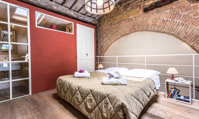 Loro Ciuffenna Apartment | La Badia, a loft studio apartment, surrounded by greenery