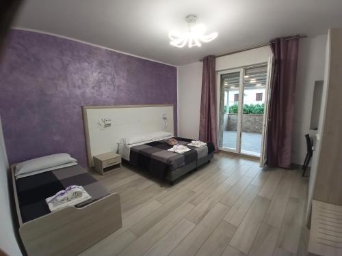 Ferrara House | La Dea Rooms