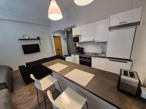 Ylamylly Apartment | Laadukas asunto ydinkeskustasta omalla autopaikalla
