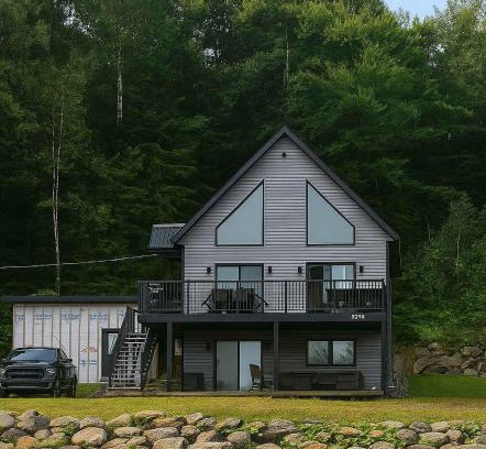 Saint-Prosper Ski Chalet | Lake and Pool table - The Dorchester