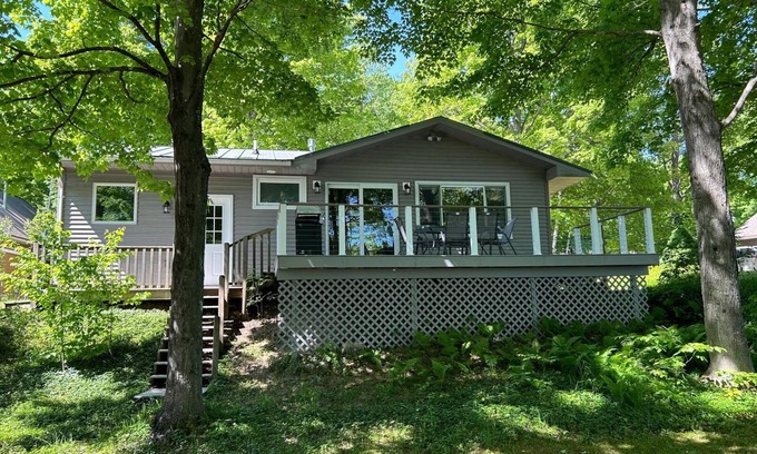 Lake Ann Cottage | Lake Ann, MI cozy waterfront cottage, newly remodeled with private beach & dock