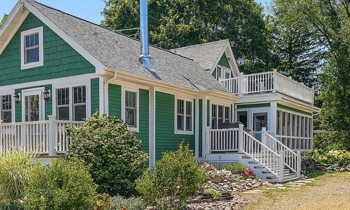 Delavan Lake Cottage | Lake Delavan Hideaway - Carl’s Cottage - Waterfront Bliss, Dock & Cozy Fireplace