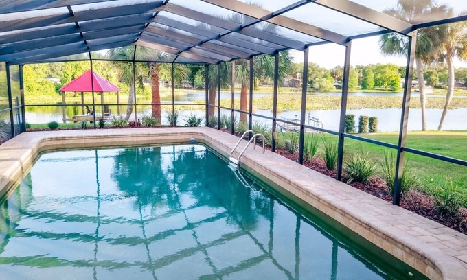 Inverness House | Lake Front, Pool Home with Boat Dock