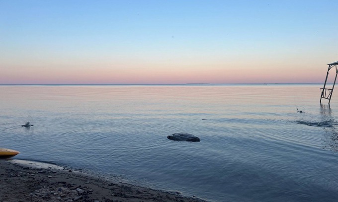 Au Gres House | Lake Huron view just a minute walk to private sandy beach.