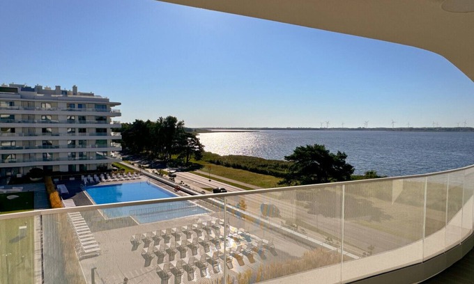 Trzebiatow Apartment | Lake pool view with private beach access Garage