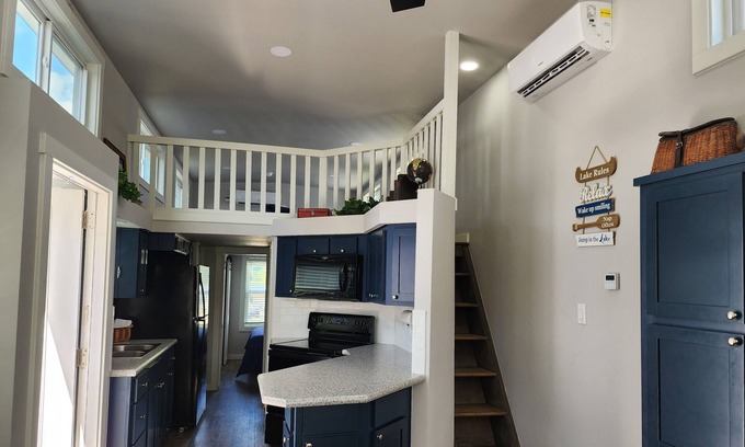 Berryville Cabin | Lake Side Tiny Home, large deck.