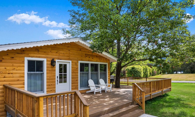 Silver Bay House | Lake-view home with large deck, grill, lawn, & mtn views - dog-friendly