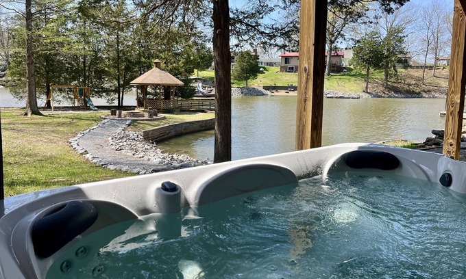 Wolf Creek House | Lakefront Boho Chic 4BR | Playground & Waterslide