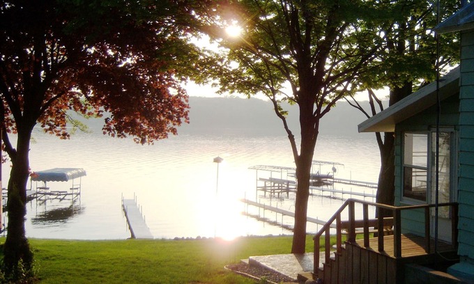 Angola Cottage | Lakefront cottage on first basin of Lake James. Dock, sandy bottom, great sunset