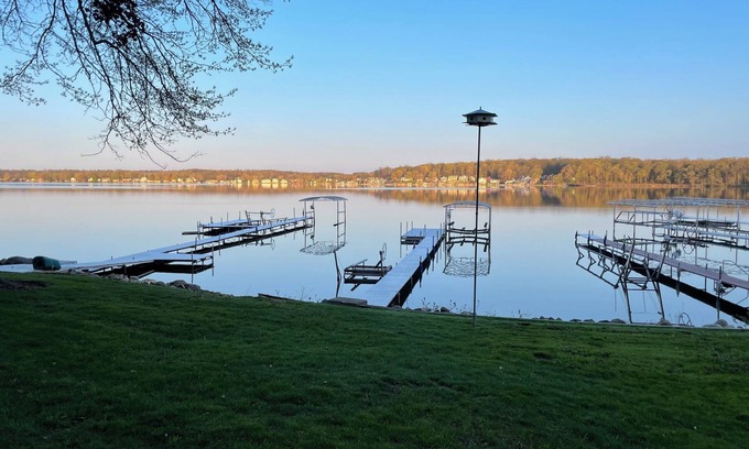 Angola Cottage | Lakefront cottage on first basin of Lake James. Dock, sandy bottom, great sunset