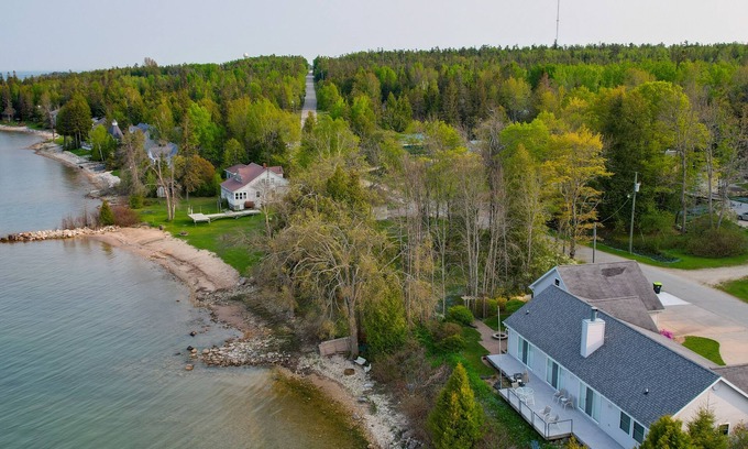 De Tour Village House | Lakefront De Tour Village Home w/Deck & Fire Pit!