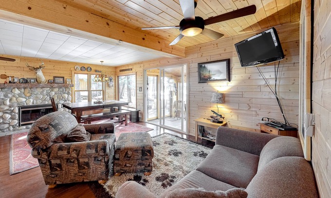 Lac du Flambeau House | Lakefront home with dock, swimming area, & wood stove - sunset views