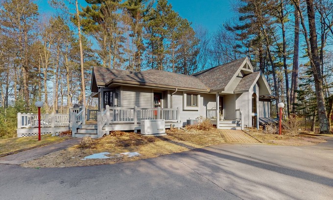 Hazelhurst House | Lakefront home with private outdoor sauna, dock, firepit, wood fireplace & patio
