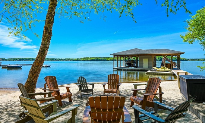 Bumpass House | Lakefront home with views, private hot tub, central AC, dock & waterslide
